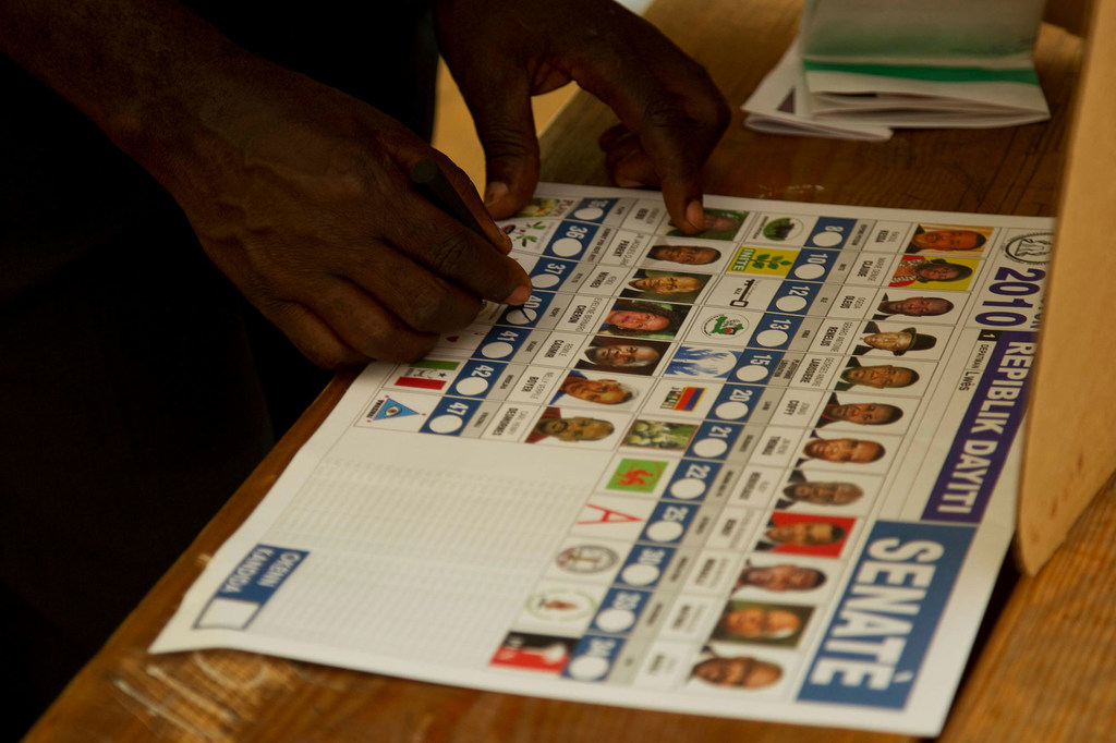 A man votes in elections in Haiti in 2010. (file)